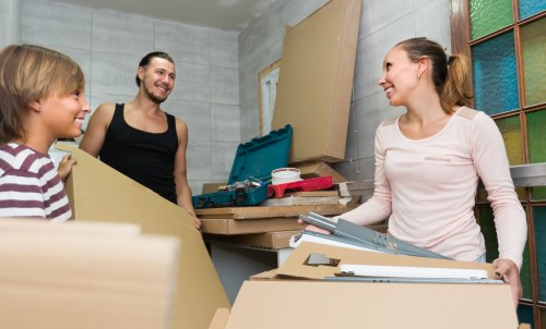 Removal team reviewing safety measures before a move
