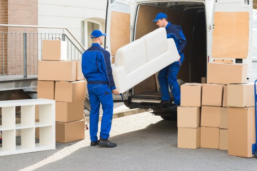 Removal team handling boxes and furniture for Paddington customers