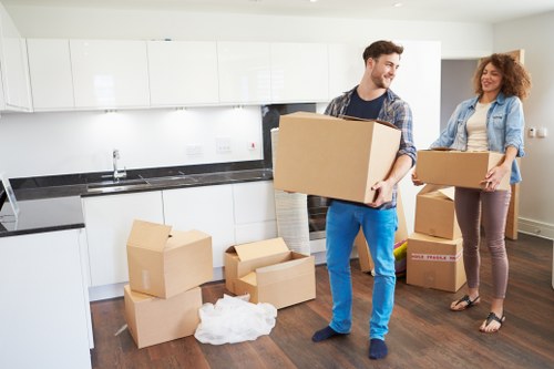 Local removal team preparing furniture for transport in Paddington