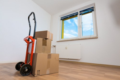 Furniture and boxes being transported by removal van in Paddington