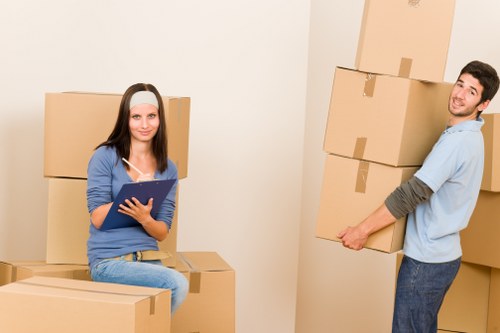Packed boxes and furniture ready for transport in a Paddington move